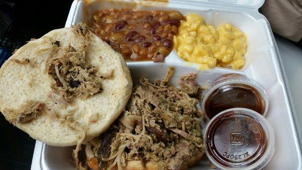 Pulled pork with sweet bbq sauce, mac n cheese, and the best baked beans ever.