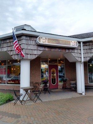 Hofherr Meat Co. entrance. Few tables outside for eating sandwiches!