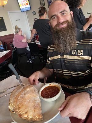 My hubby happy with his HUGE Calzone