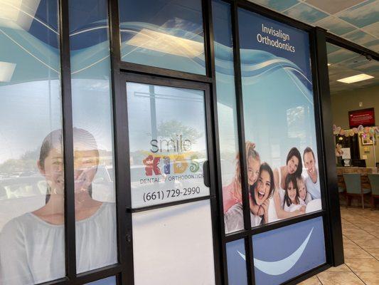 Separate entrance to SMILE DENTAL beside the check in counter for Advance Imaging Center