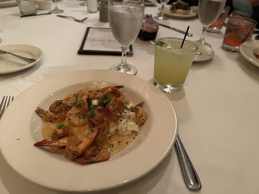 Shrimp with Cajun sauce over a bed of mashed potatoes. We created this special meal. So good! Awesome sous chef. Margaritas are fab!