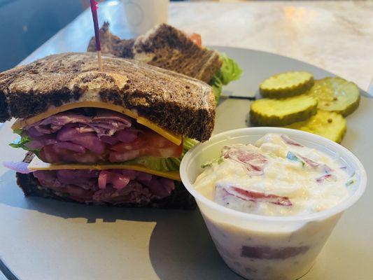 Rare Roast Beef sandwich & potato salad.