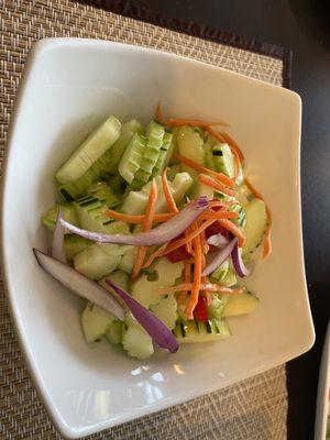 Cucumber salad.  The dressing was a bit too sweet, but good if you didn't dig deep into the bowl.