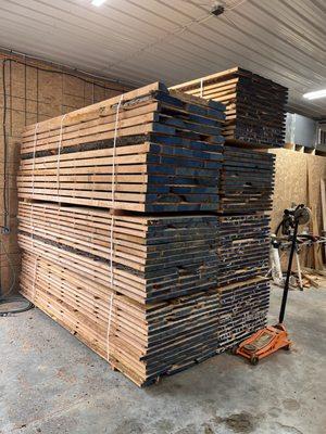 Fresh sawn lumber stacked and staged to go in the kiln