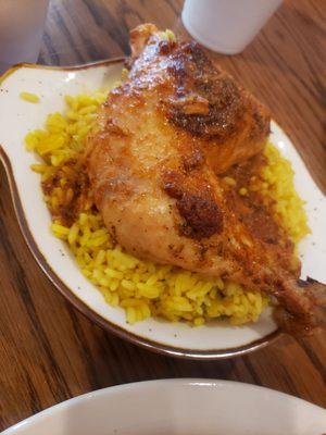 Baked chicken on saffron rice