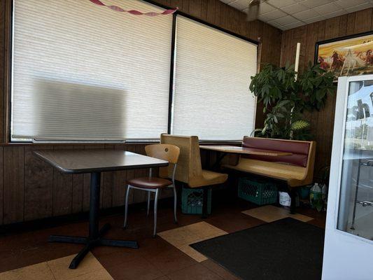 Single booth in the corner.