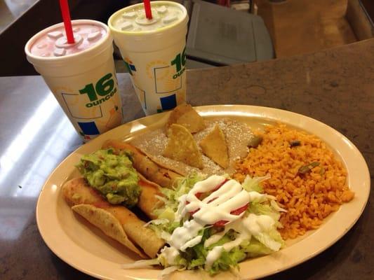 Chicken taquitos w/Agua Frescas are good! Strawberry Jamaica & Pineapple Spinach :)