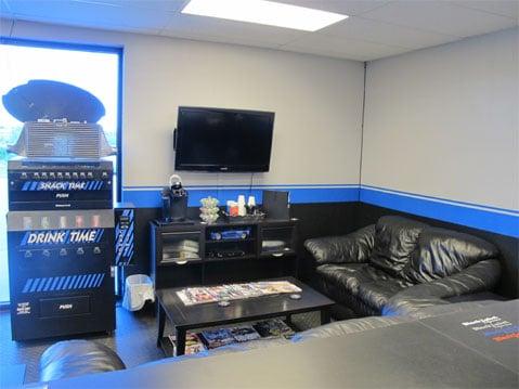 Our plush waiting room, equipped with leather couches, free wifi, HDTV, Playstation3, complimentary Kuerig coffee and soda/snack