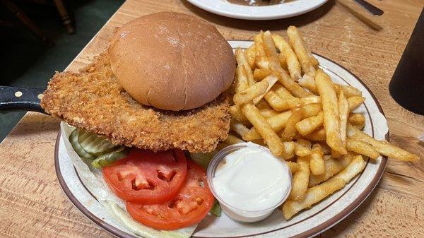 Pork tenderloin sandwich and fries