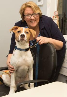 Two thirds of owner, Lori Lucas' face and the shop mascot, Axle.