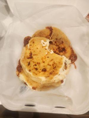 pupusa. Sorry i took a bite before the picture. I could not resist . So good!