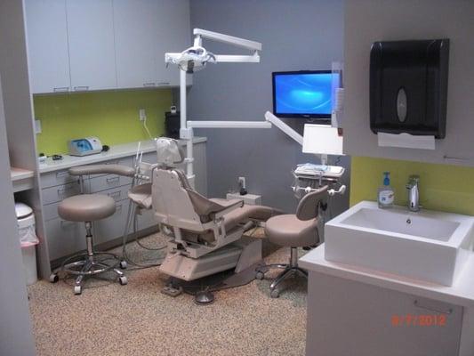 Clean and modern operatories equipped with digital x-rays, computers, and flat screen tv