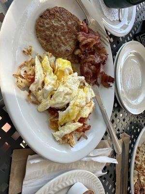 2 eggs over easy, hash browns, sausage & bacon