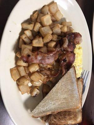 Eggs, bacon, hash browns, and toast