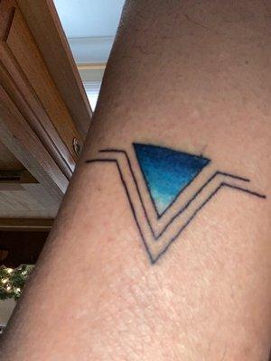 My first tattoo.  Love the look of it on my ankle.