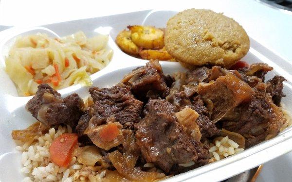 Oxtail, Jamaican cabbage, plantains, cornbread