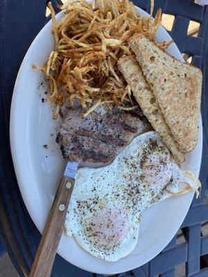 Grilled pork loin, hash browns and eggs. Very good!