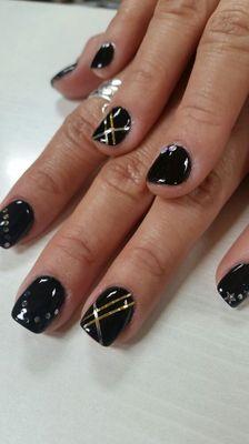 Beautiful design and powder  gel manicure. This month is the month for designs. Half off everything