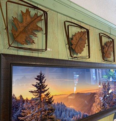 These are handmade, rusted pieces mounted above a local photograph created by our own Doug Cavanah.  Wouldn't this look good in your house?