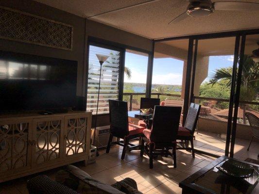 Living room area and view of the patio