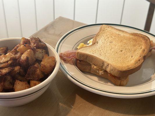 egg and cheese sandwich and homefries