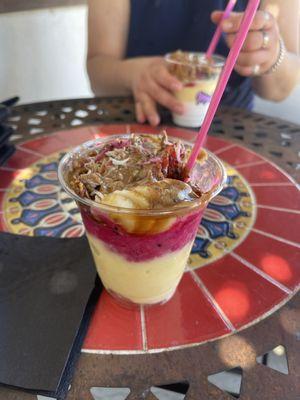 Passion Fruit, Pitaya base with bananas, strawberries, granola, chia seeds, honey, almond butter, coconut shreds