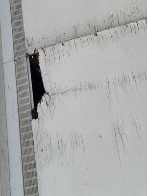 Rotting roof over the deck.