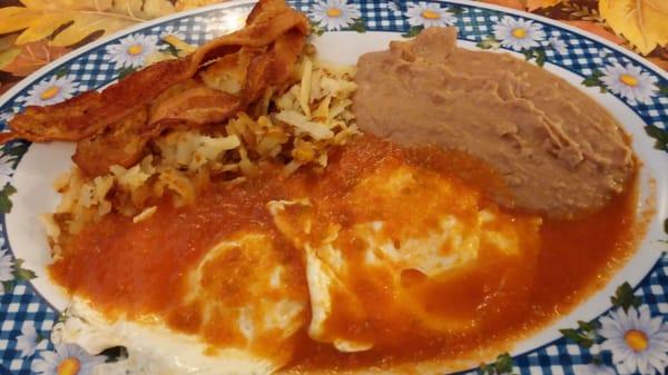 Huevos rancheros with hash browns, beans and choice of bacon and tortilla (#2 breakfast plate). Muy delicioso!