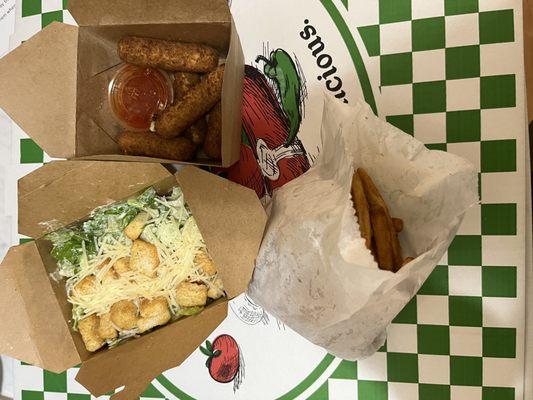 Mozzarella sticks, Caesar Salad and large Fries.