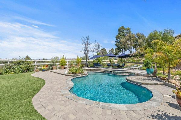 Are you looking for a Pool home with a view? This one is incredible!