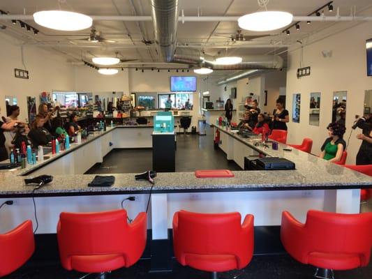 Our 22 chair Blow Dry Bar with granite counter top and super cool and comfortable styling chairs.