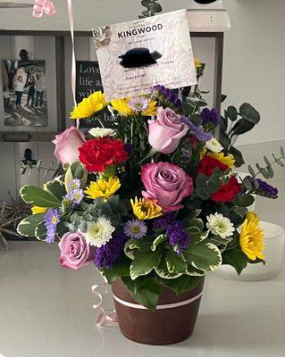 Arrangement she received.