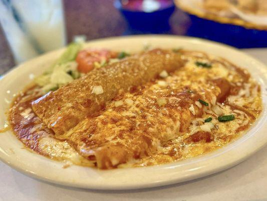 Beef enchilada and cheese enchilada.