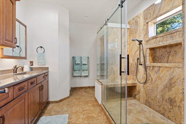 Master bathroom with dual sinks, countertops and shower boast beautiful granite, this home was sold in Sierra Vista, AZ.