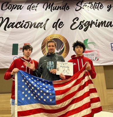 Coach Alex with his students at an international competition.