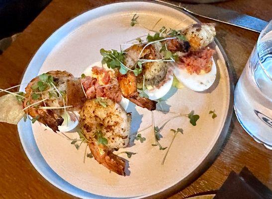 DEVILED EGGS - Grilled Cajun shrimp, potato crisp, tazo ham, chili oil.