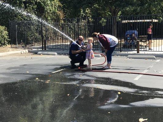 She even got to spray the hose!