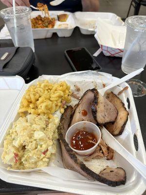 Brisket, pulled pork and 2 sides. Killer BBQ sauce!