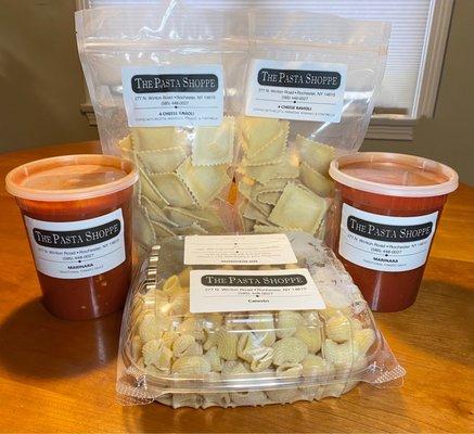 Selection of pastas ravioli and sauces.