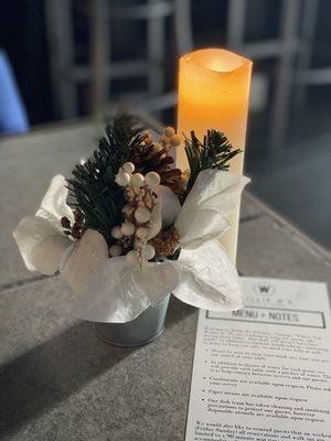 Holiday table decor with digital menu and health safety info