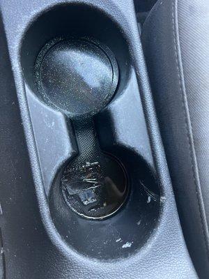 Unknown liquid in cup holder at pick up following a detail