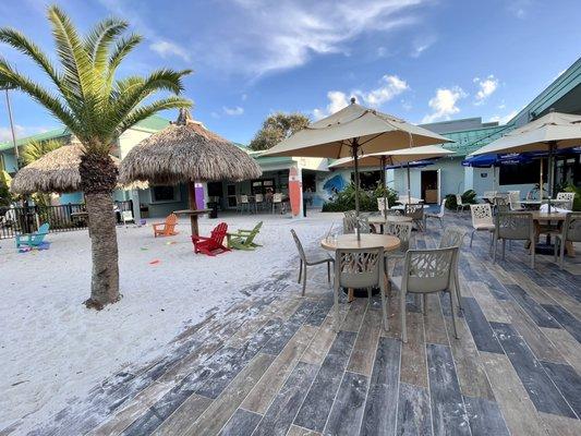 bar area and little beach by the pool