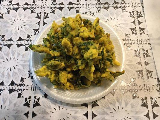 Palak (spinach) pakora - this photo shows just a fraction of the huge portion of spinach pakoras we got for our takeout order!