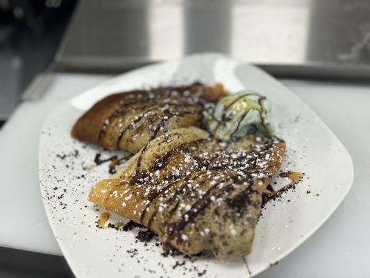 Crepes with chocolate and caramel drizzle