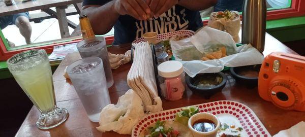 Berrian tacos, shrimp, tilapia tacos, and steak burritos