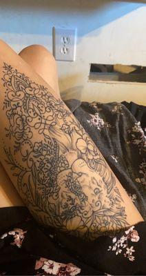 Half lion half mandala thigh tattoo done by Olivia Mackling