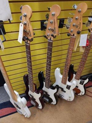 Some electric basses