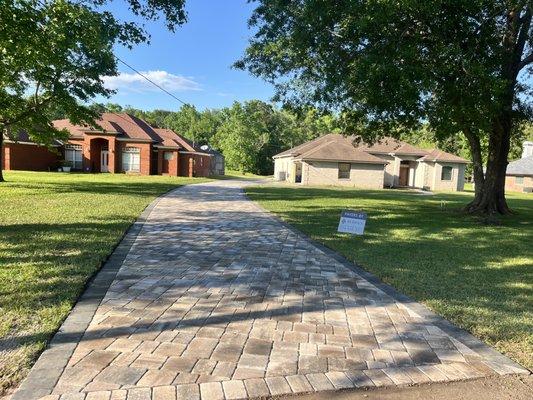 Driveway installed using Mega Olde Towne Pavers LionsBridge Color with Granite border