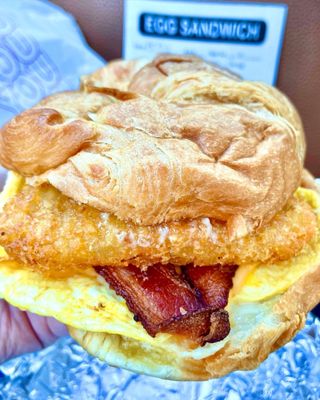 Bacon, Egg, Cheese croissant with mayo & hashbrown