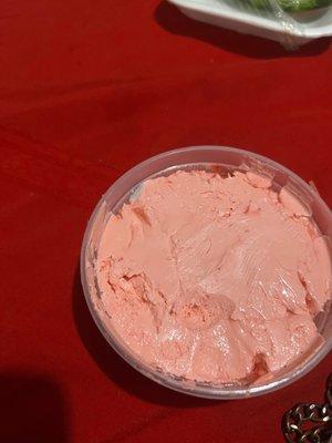 Cream cheese: strawberry. Mold in top left corner.